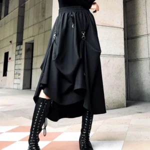 Black steampunk gothic skirt with asymmetrical hemline and metal D-ring hardware, front close-up detail view