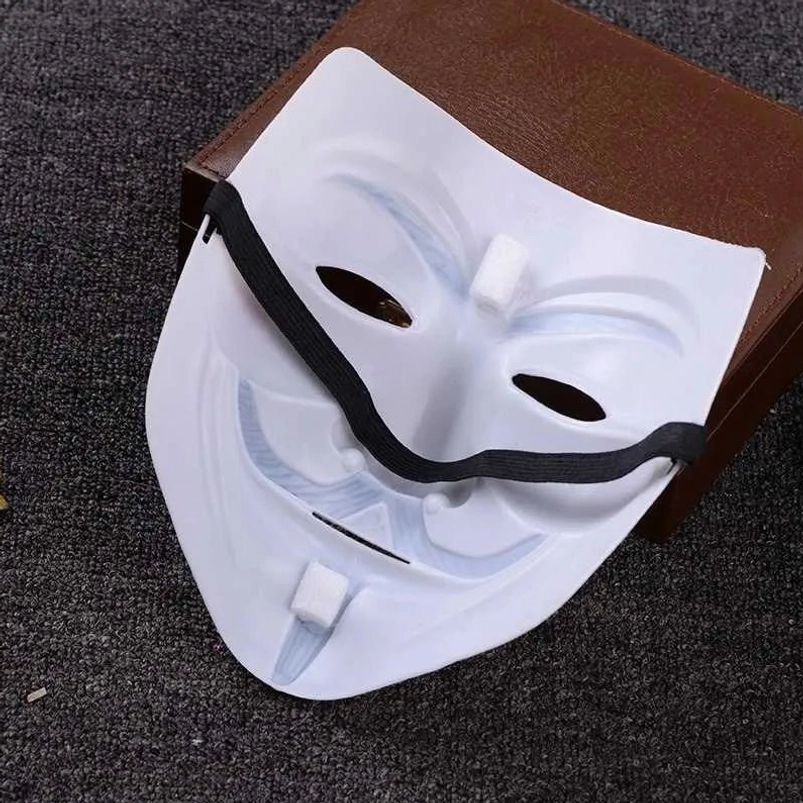 Guy Fawkes steampunk mask back view top-down angle, displaying foam padding, elastic strap attachment, and construction details on dark tabletop