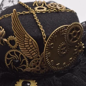 Close-up detail of steampunk hat clip showing intricate bronze wing ornament, metal gears, clock dial, and decorative cross chains