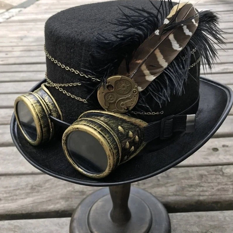 Steampunk top hat with attached brass goggles front view, striped feathers and black fur trim, layered metal chains detail