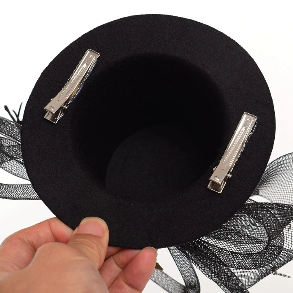 Steampunk mini top hat interior view showing two metal hair clips for secure fit and wearability