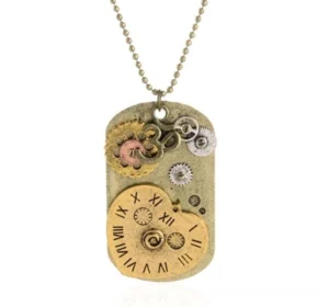 Close-up detail view of steampunk heart-shaped clock pendant with Roman numeral dial and miniature gear ornaments on ball chain