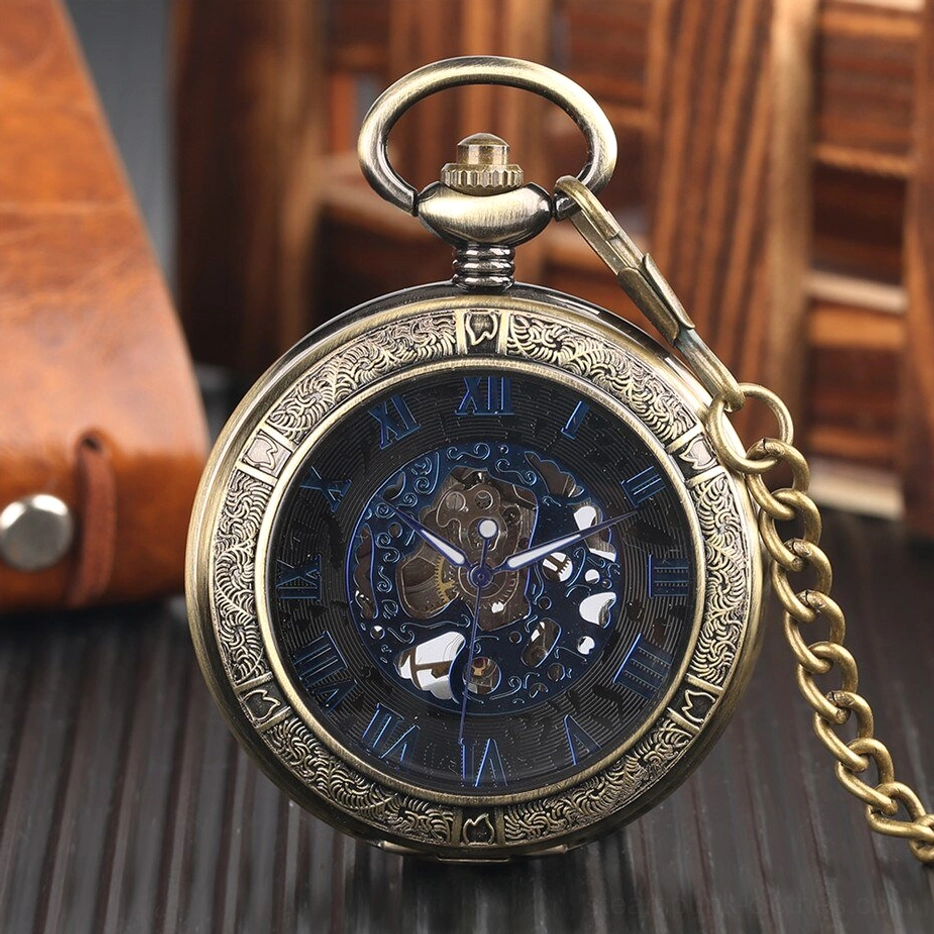 Hollow bronze steampunk pocket watch with carved decorative border, blue Roman numerals, and visible inner gears attached to metal chain