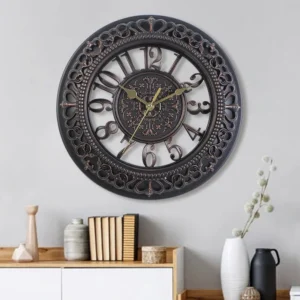 Steampunk industrial wall clock with dark bronze hollow-carved frame, 3D Arabic numerals, and retro embossed dial center displayed in modern home living room