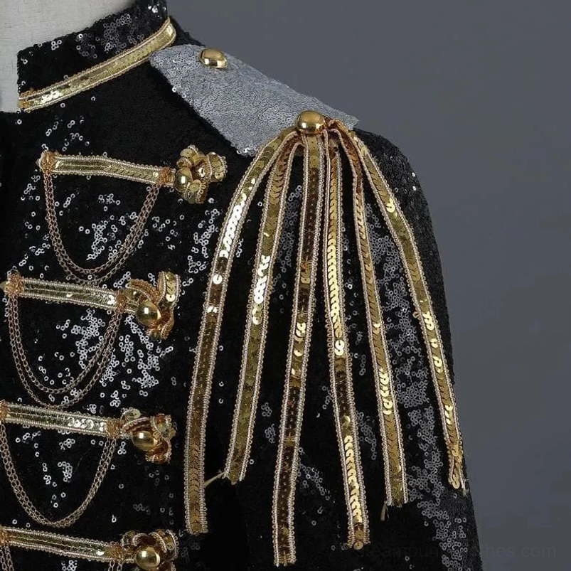 Steampunk jacket shoulder detail with silver epaulet and gold tassel trim