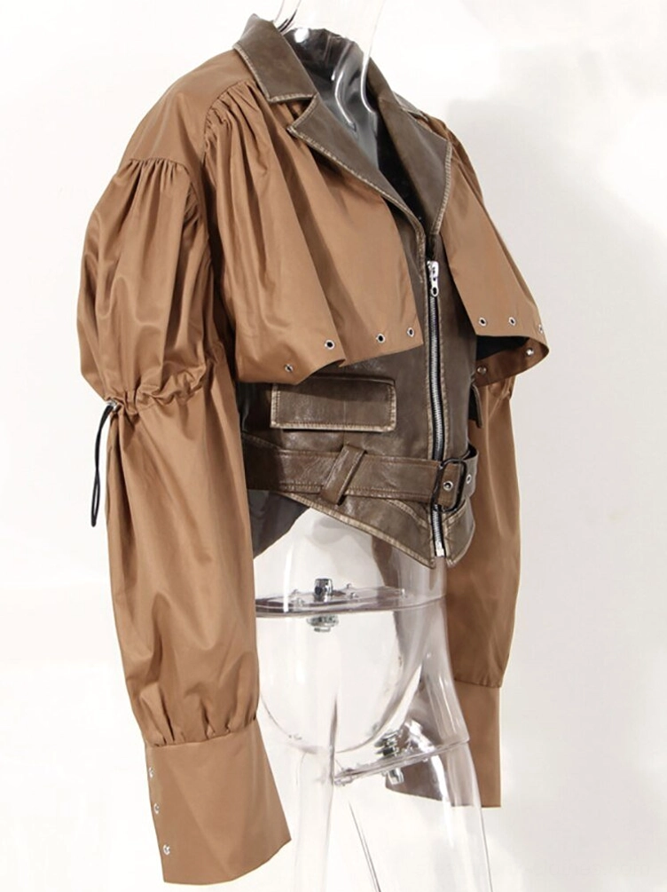 Side view of steampunk cropped leather jacket on clear mannequin showcasing adjustable drawstring cuffs, cropped length, and structure of side seams