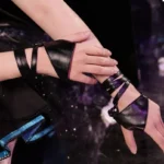 Black steampunk half-finger lace-up wrist gloves with adjustable wrap straps and buckle detail, worn on female hands against dark gothic party background