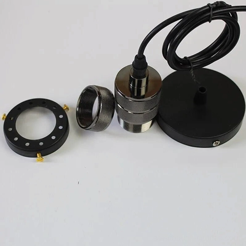 Steampunk pendant lamp installation kit showing black ceiling base, threaded adapters and power cord assembly components