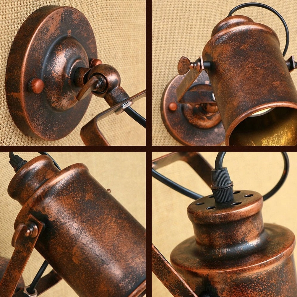 Steampunk lamp wall mounting base, top-down close-up of round bronze iron construction with adjustment screw knob and fixing hardware