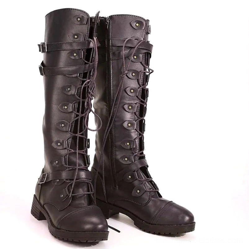 Steampunk leather knee-high boots front three-quarter view displaying lace-up detailing, side zipper, and buckle accents with studio lighting