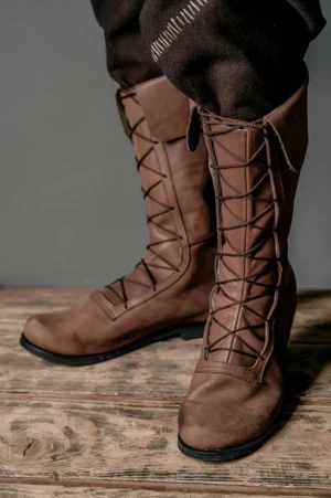Men's steampunk brown leather lace-up boots with fold-over cuff detail, three-quarter side view showcasing authentic mid-calf height and Victorian-inspired design