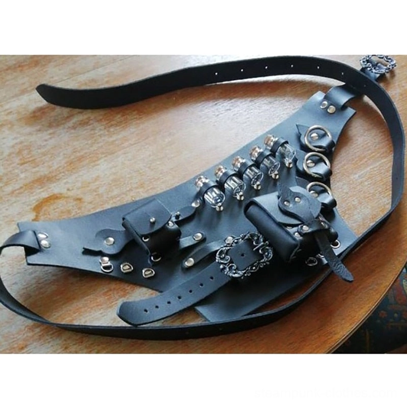 Black matte leather steampunk utility waist belt with corked glass vials, metal D-rings, ornate buckle hardware, and side leather pouch - overhead flat lay on wooden table surface