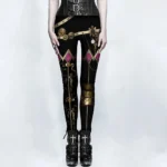 Women's black steampunk leggings with brass gear and chain prints, front full view showing mid-rise waistband and purple rhombus accent pattern on studio background