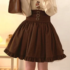 Dark brown steampunk lolita skirt with triple vintage square buckles on waistband, featuring ruffled hem and voluminous A-line silhouette in front view