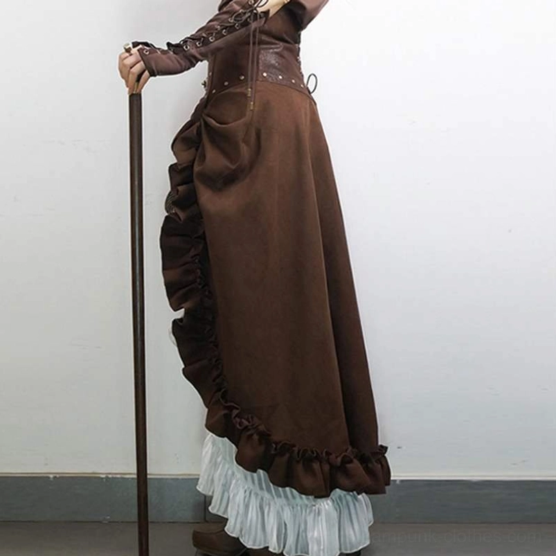 Long brown steampunk ruffled skirt side profile showing white ruffled underlayer and hem