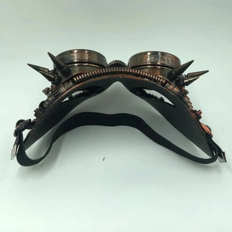 Aged copper steampunk goggles mask rear underside view showing spike details and gear elements with elastic band