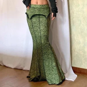 High-waisted steampunk mermaid fishtail skirt in olive damask print with black trim, front facing studio photography