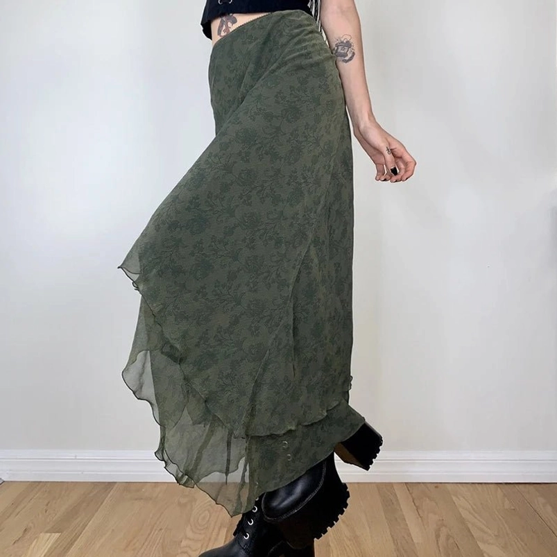 Asymmetrical steampunk chiffon skirt side three-quarter view showing sheer lightweight fabric and high-low hem detail with tonal floral pattern