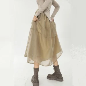 Beige steampunk midi skirt rear three-quarter view showing voluminous silhouette and organza overlay