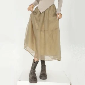 Khaki sheer organza steampunk midi skirt front view on model in white studio