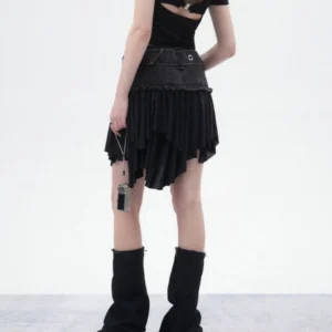 Black asymmetrical pleated denim mini skirt back view - showing ruffled asymmetric hem and gothic style details