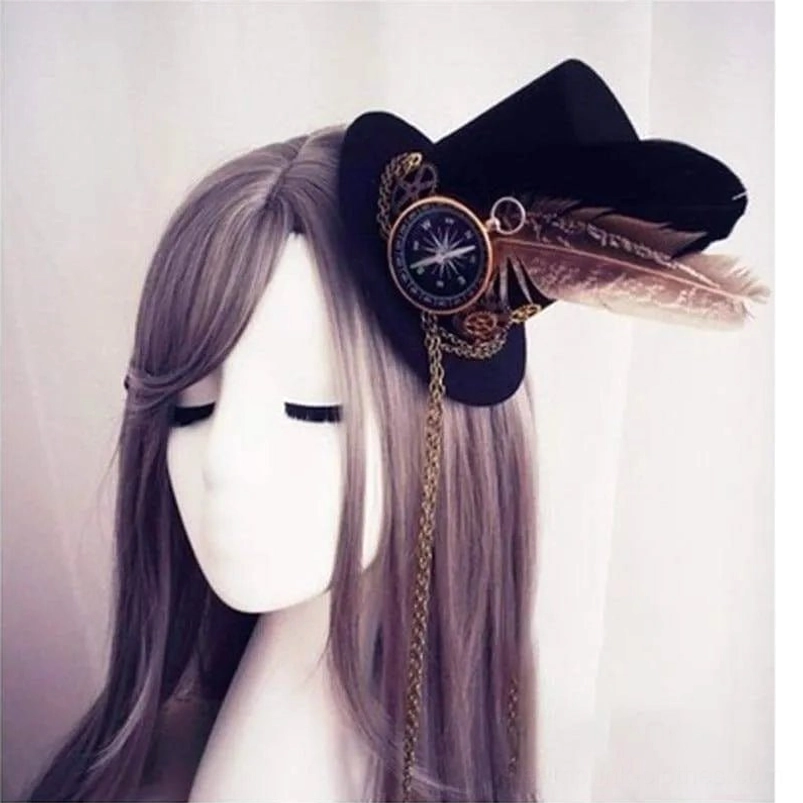 Steampunk mini top hat worn on mannequin with purple wig displaying compass, feather, brass gear and chain decorations from side angle