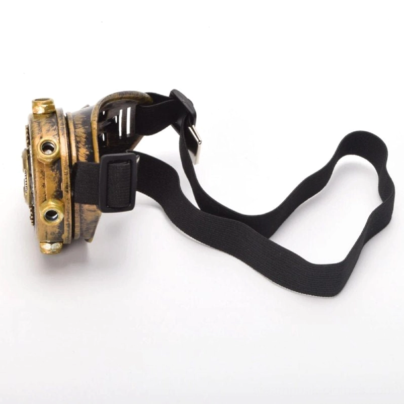 Rear view of steampunk monocle goggle displaying plastic adjuster buckle, distressed metal finish, and elastic webbing construction on white background