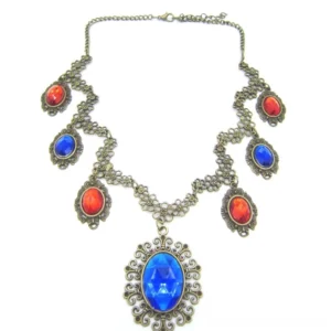 Steampunk vintage necklace flat lay overhead view displaying adjustable chain clasp, antiqued bronze metalwork, intricate filigree gem settings, and large central blue oval pendant