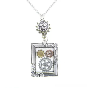 Antique silver plated steampunk photo frame necklace with clock gear pendant charm and decorative mixed gears on pure white backdrop