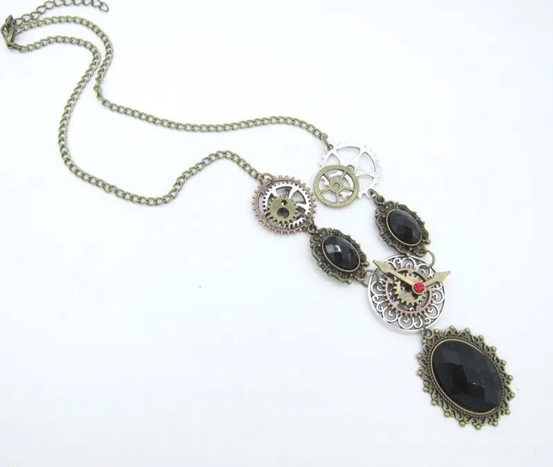 Steampunk vintage necklace side flat lay displaying antique bronze chain detail, clockwork mechanisms, and black oval gemstone settings on white background