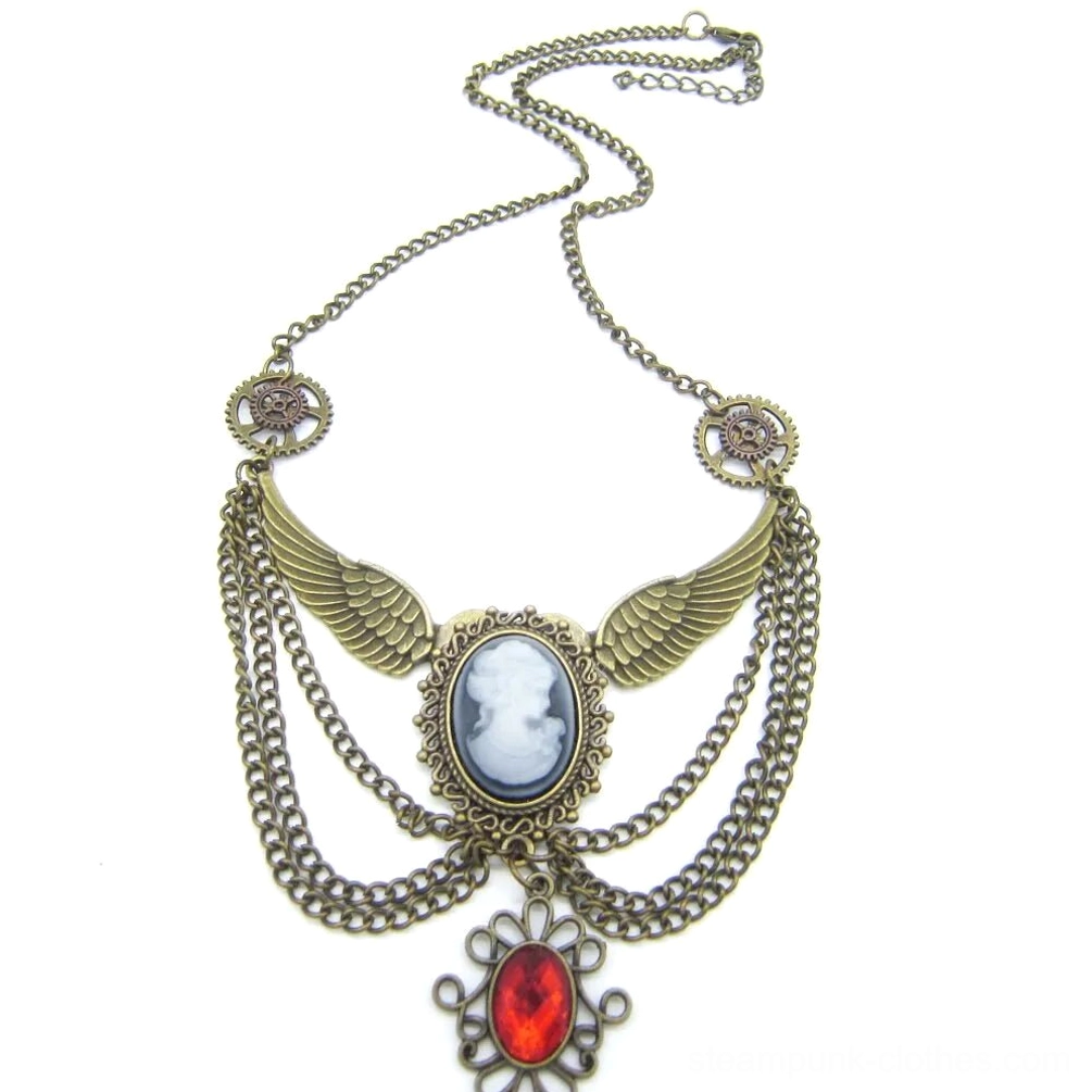 Complete steampunk winged cameo necklace laid flat showing full chain length and antiqued bronze finish from angled perspective