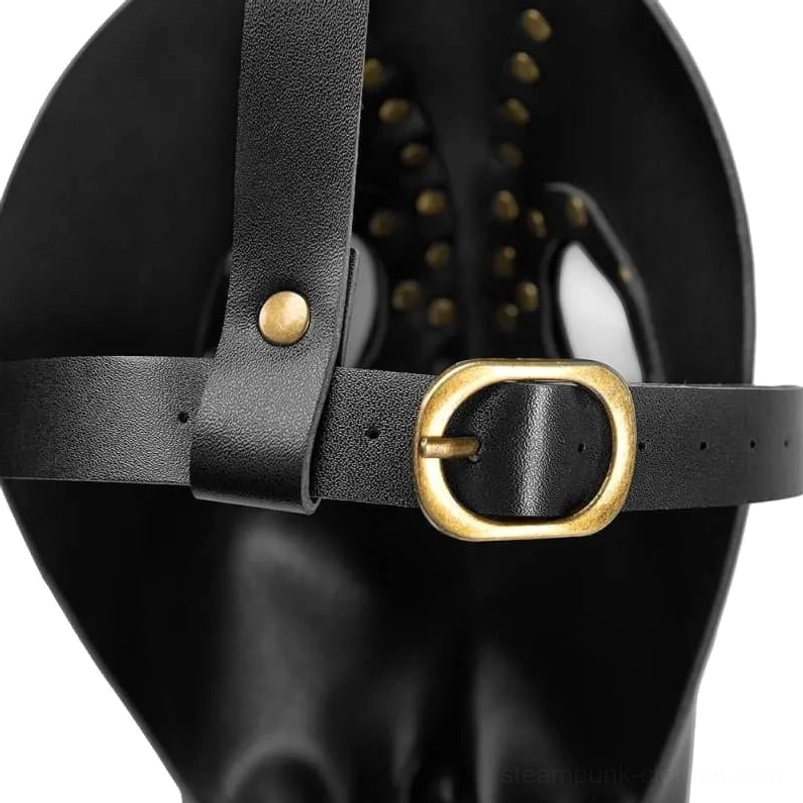 Close-up of steampunk octopus mask hardware bronze rivets and adjustable buckle strap