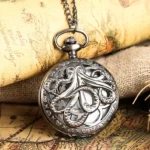 Steampunk octopus hollow pocket watch front view with antique silver carved cephalopod cover on vintage map background