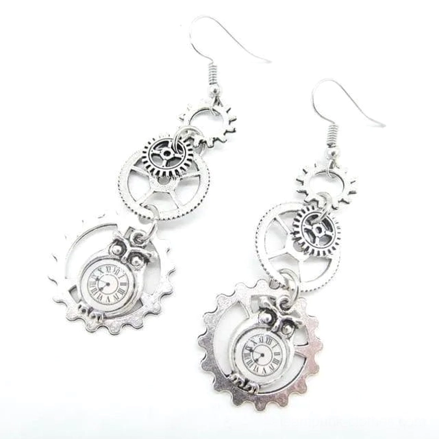 Silver tone steampunk owl earrings with stacked gear accents and owl pocket watch design in polished silver metal