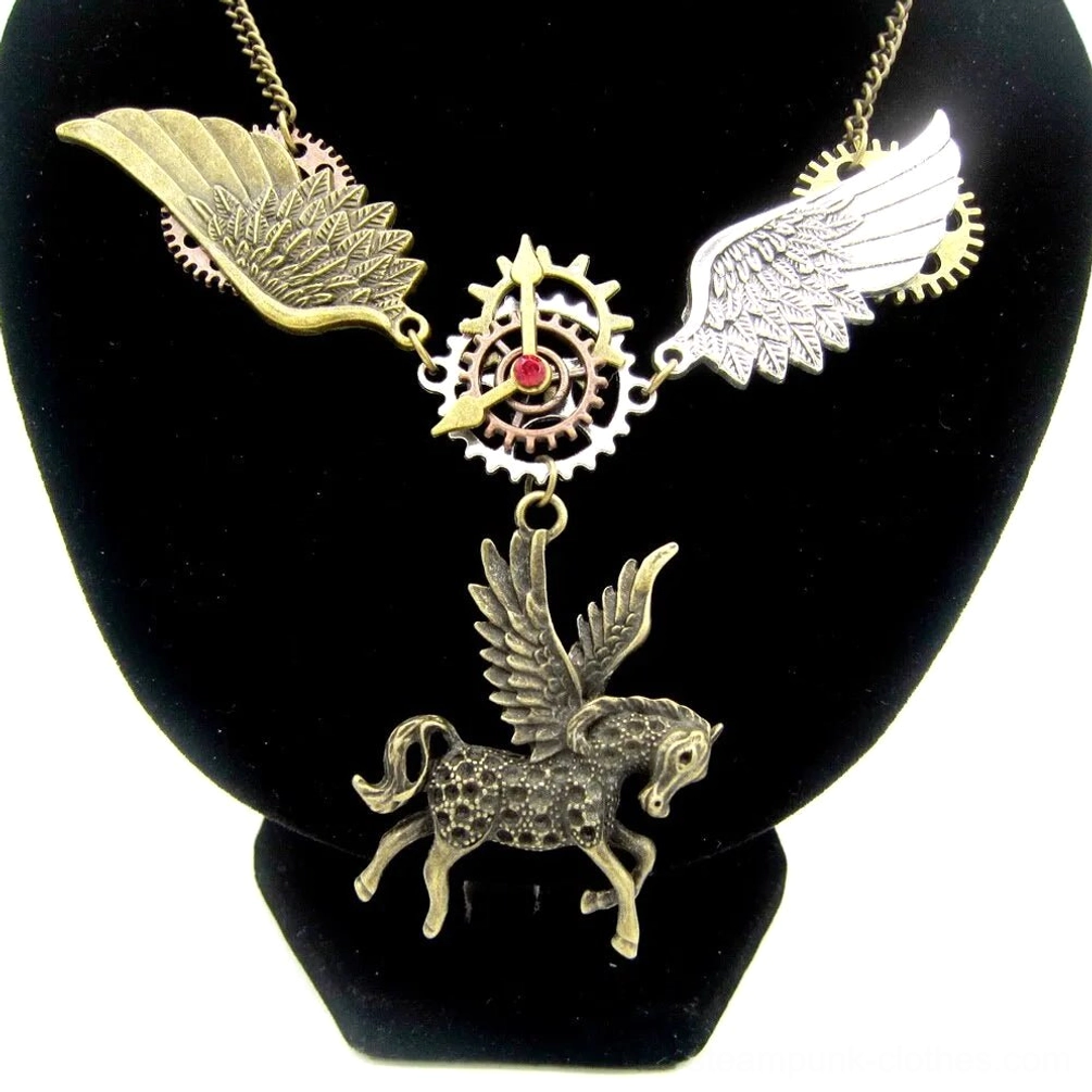 Steampunk Pegasus necklace worn on display bust featuring bronze dual-tone wings, intricate gear accents, and red crystal centerpiece against black velvet background