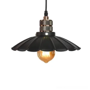 Scalloped black matte industrial pendant lamp with exposed tungsten bulb and hanging cord, front full view against white background