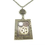 Steampunk photo frame necklace with bronze plated finish, featuring ornate rose-carved frame and intricate gear ornaments on white background