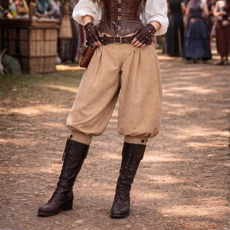 Women's steampunk pirate breeches styled outfit, khaki color with cropped pleated legs, paired with leather boots and gloves in medieval market setting