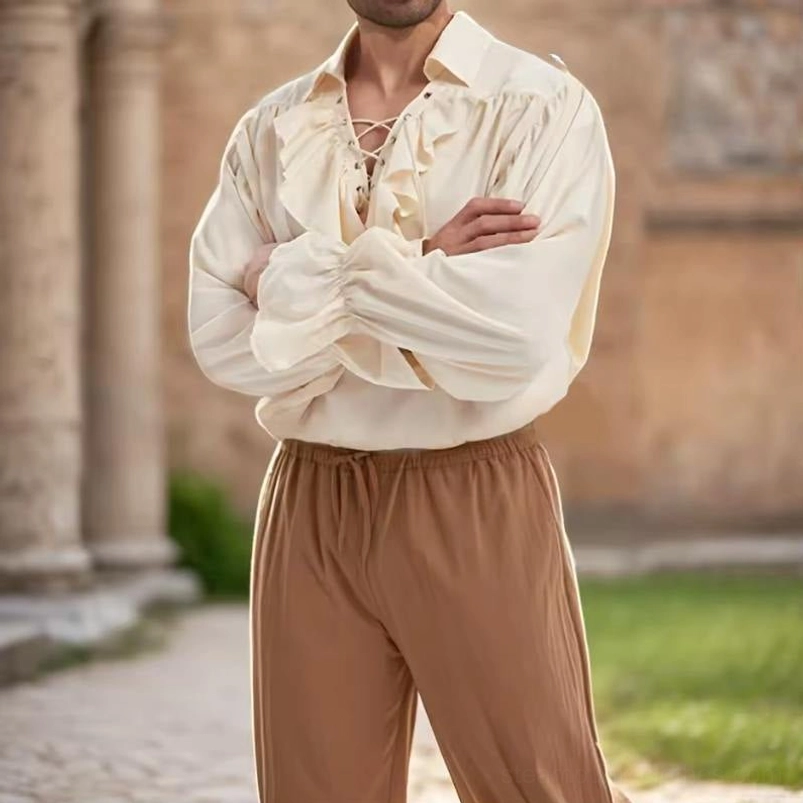 Steampunk pirate shirt styled with medieval loose brown elastic pants in vintage stone courtyard setting, complete historical reenactment outfit