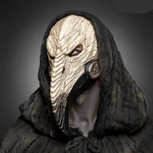 Front view of steampunk plague doctor mask featuring carved bone beak, single eye slit design, and embossed metal side filter on dark studio background