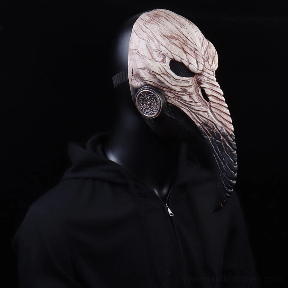Right side close-up of steampunk plague doctor mask on head mannequin wearing black hoodie against dark studio background, featuring marbled pale pink-beige textured beak and ornate metal side filter
