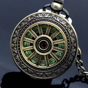 Vintage steampunk pocket watch with carved bronze frame and glowing green skeleton dial, front overhead close-up view