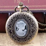 Bronze cameo steampunk pocket watch front view with carved lady profile, displayed on vintage book and newspaper background