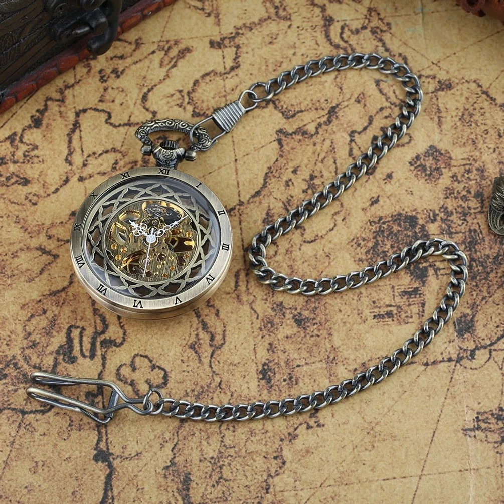 Steampunk pocket watch with twisted link chain displayed flat in top-down oblique angle on aged vintage map background, showcasing aged bronze metal and hollow dial with exposed movement