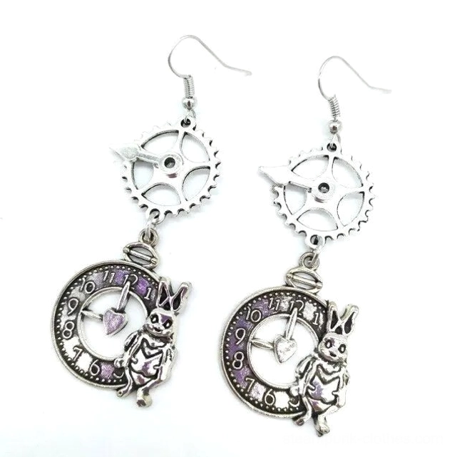 Silver steampunk pocket watch earrings with heart-centered dial design and mechanical details