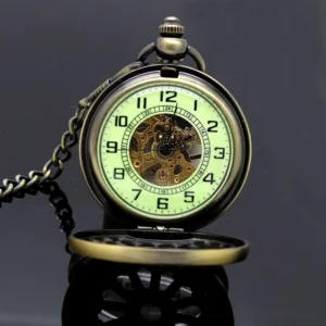 Flip-cover steampunk pocket watch displaying luminous green numerals and exposed mechanical gears in dark studio