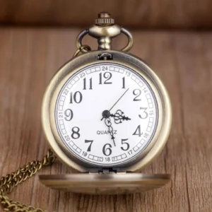 Vintage steampunk pocket watch with flip cover open displaying white dial with black Arabic numerals, bronze frame, and precision quartz movement
