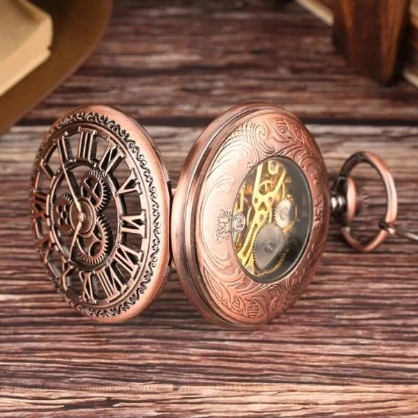 Flip-style steampunk pocket watch showing dual-sided design with Roman numerals front and floral engravings with exposed movement