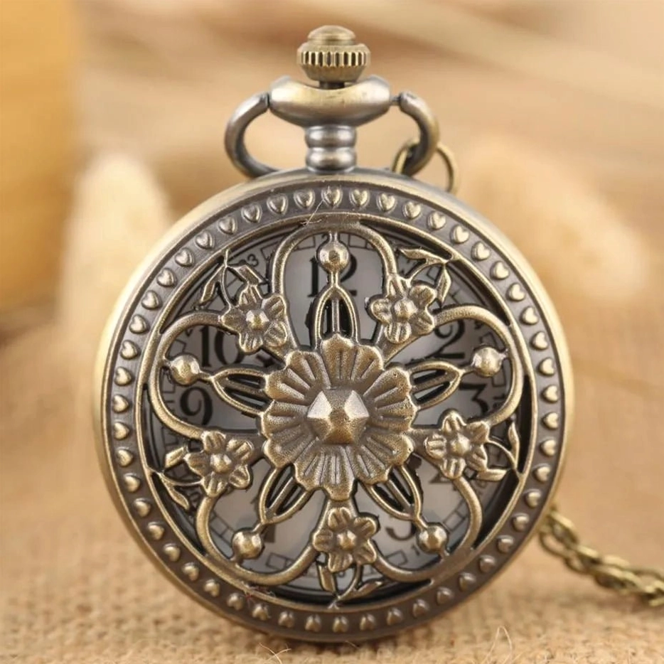 Bronze hollowed steampunk pocket watch with intricate floral carving and beaded frame, front close-up view showcasing Victorian-era design details