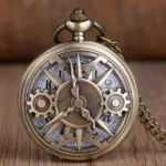 Steampunk pocket watch front view featuring hollowed gear dial with compass design, bronze-tone stainless steel case, and visible mechanical elements on wooden desktop background